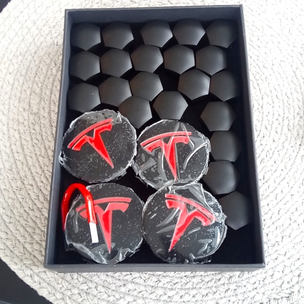 Tesla car wheel nut cover